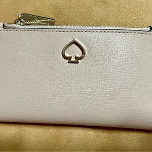 Kate Spade Cream Wallet with Gold Spade Emblem